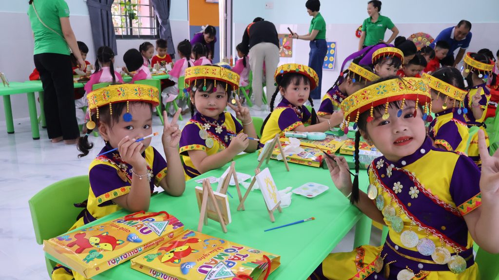 Students participating in an interactive art class at the newly renovated Ba Chuc Kindergarten in Vietnam.