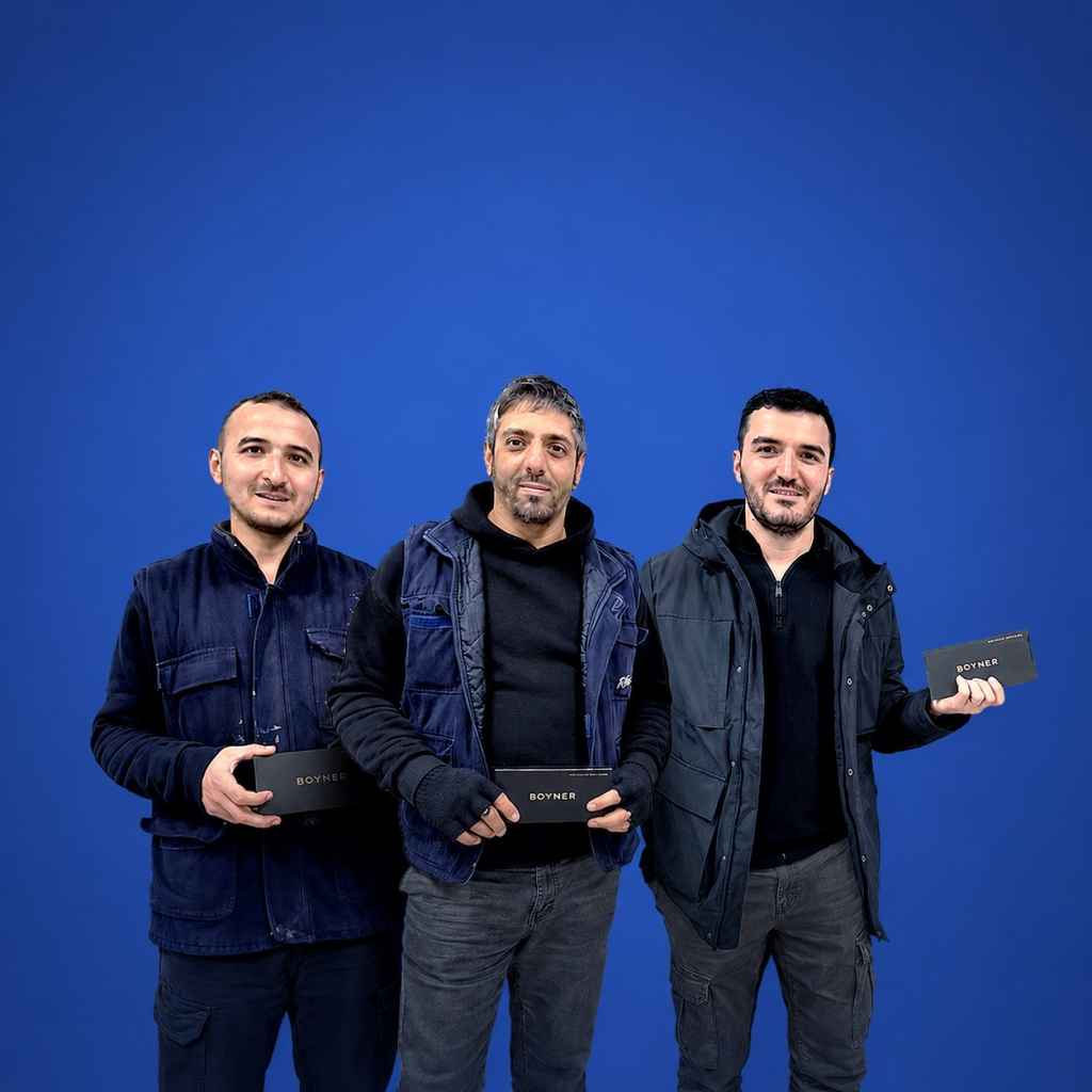The top three winners of Betek's month-long Internal Step Competition proudly posing together.